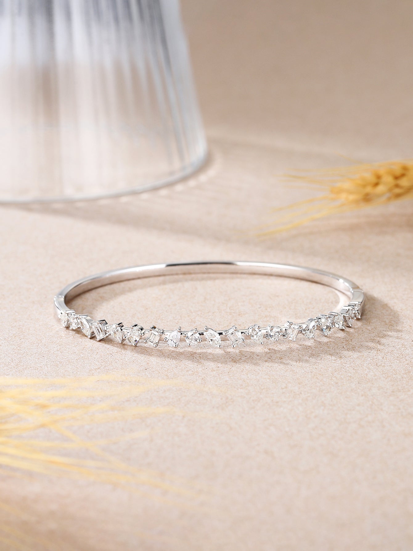 18K White gold bangle, fancy cut diamonds