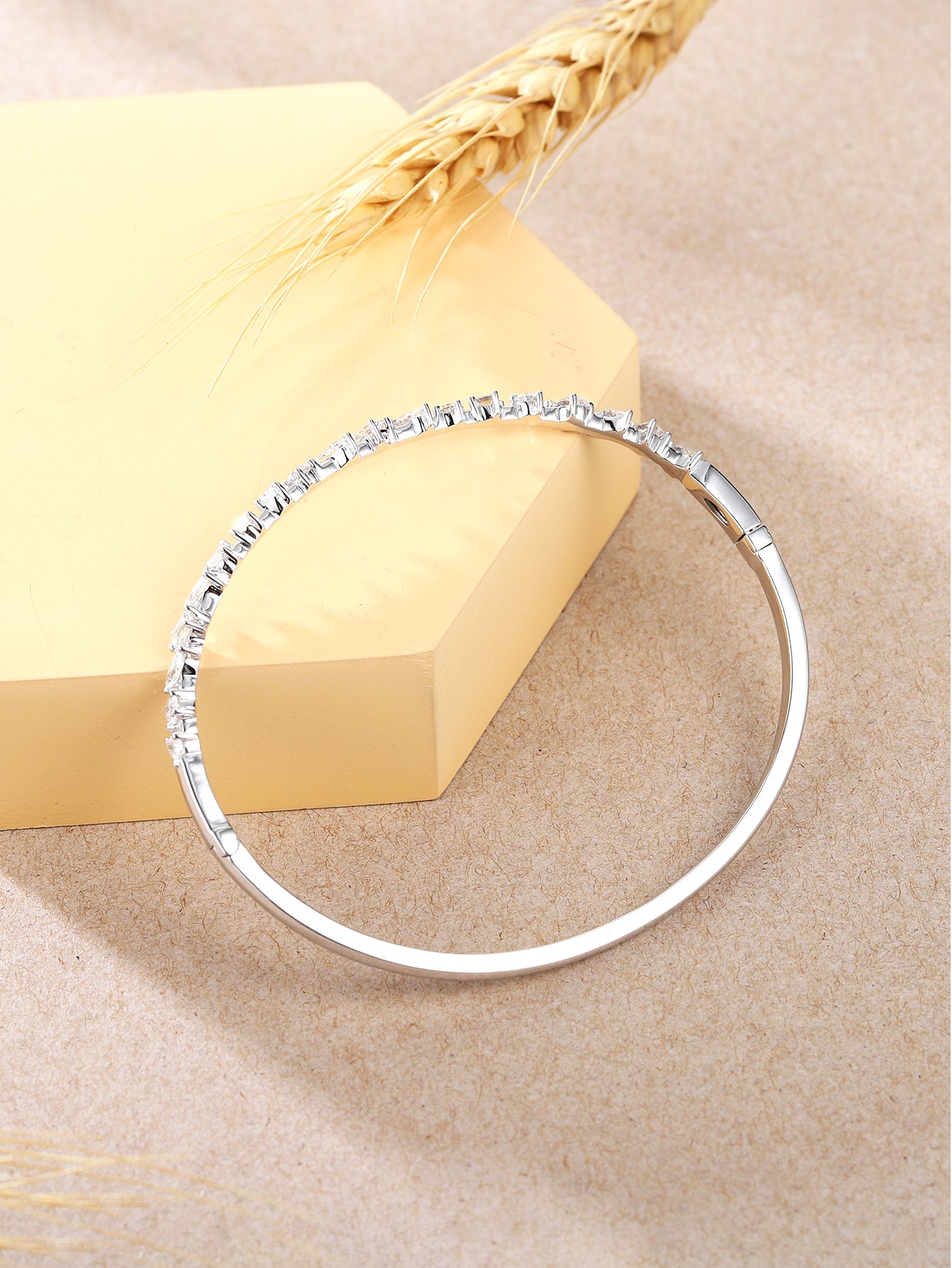 18K White gold bangle, fancy cut diamonds