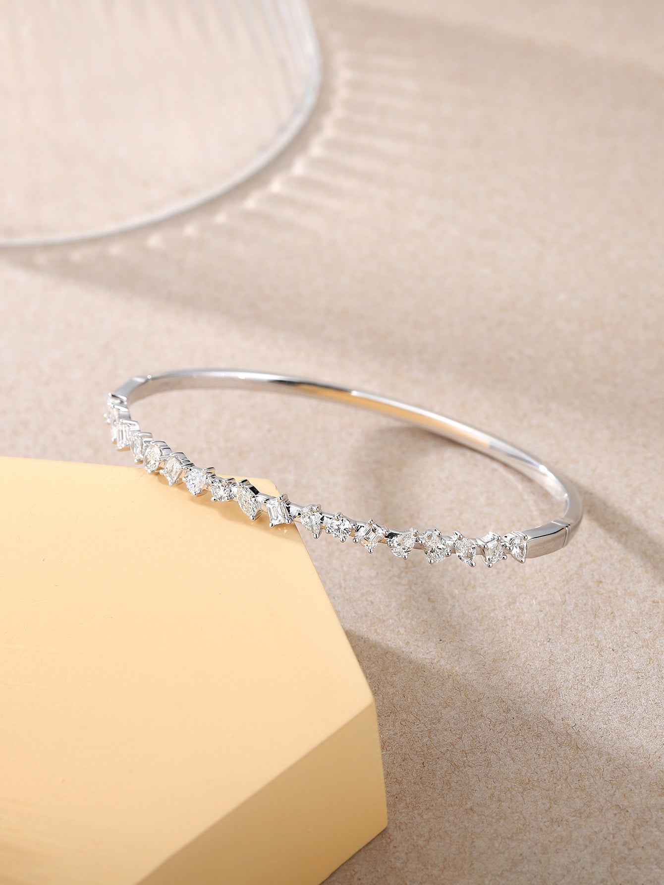 18K White gold bangle, fancy cut diamonds