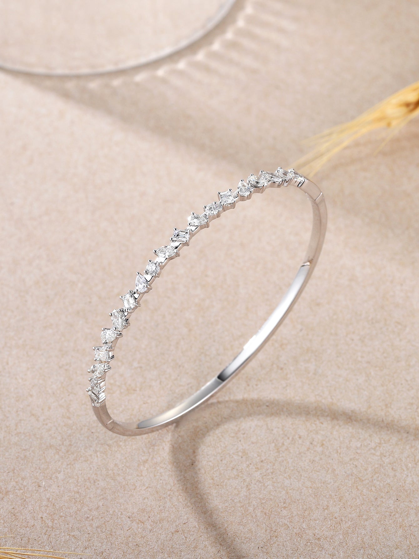 18K White gold bangle, fancy cut diamonds